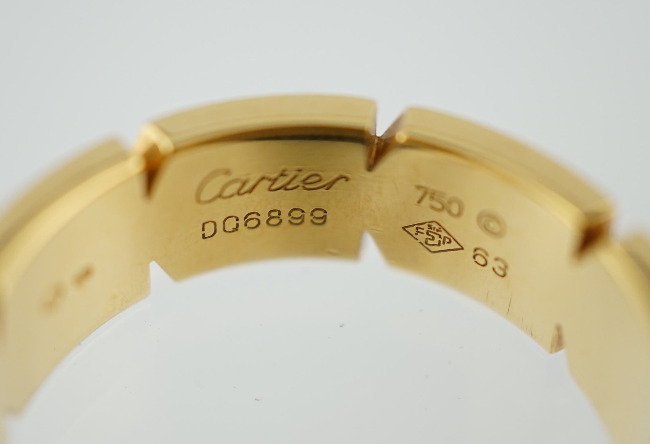 A modern 18ct gold Cartier Tank Francaise band